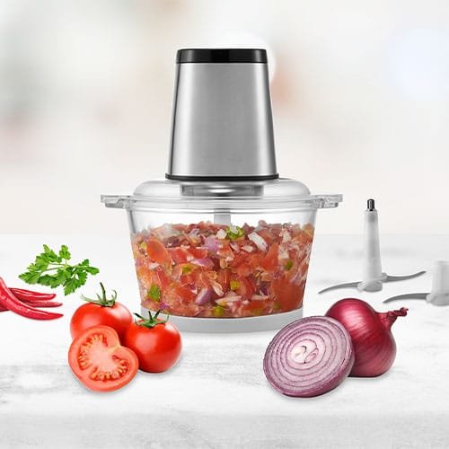 Tomatoes and onions in food processor