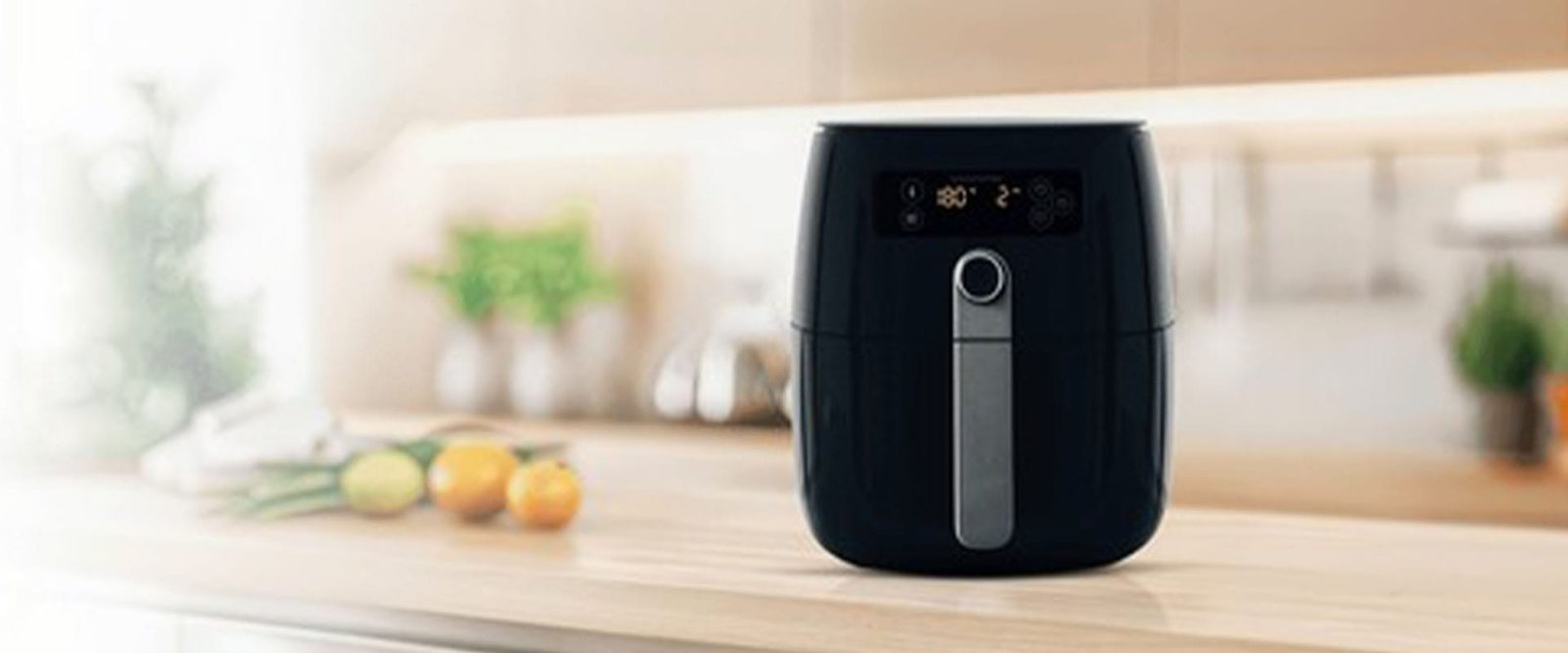 Air fryer machine cooking potato fried in kitchen. Lifestyle of n